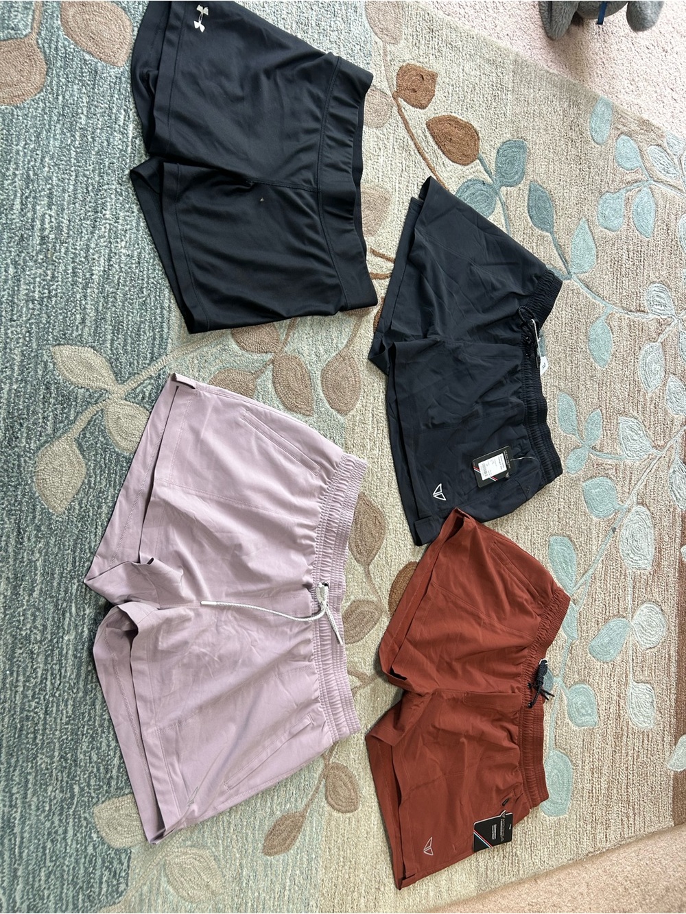 Under Armour Women’s Athletic Shorts in Black, Mauve, and Rust